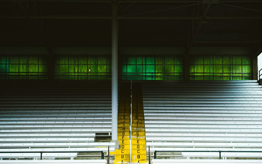 a couple of empty bleachers sitting next to each other